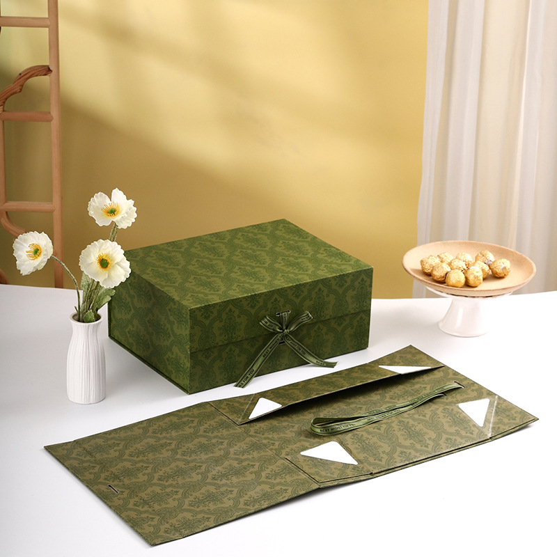 Luxury custom rigid gift boxes with embossed branding and velvet interiors.