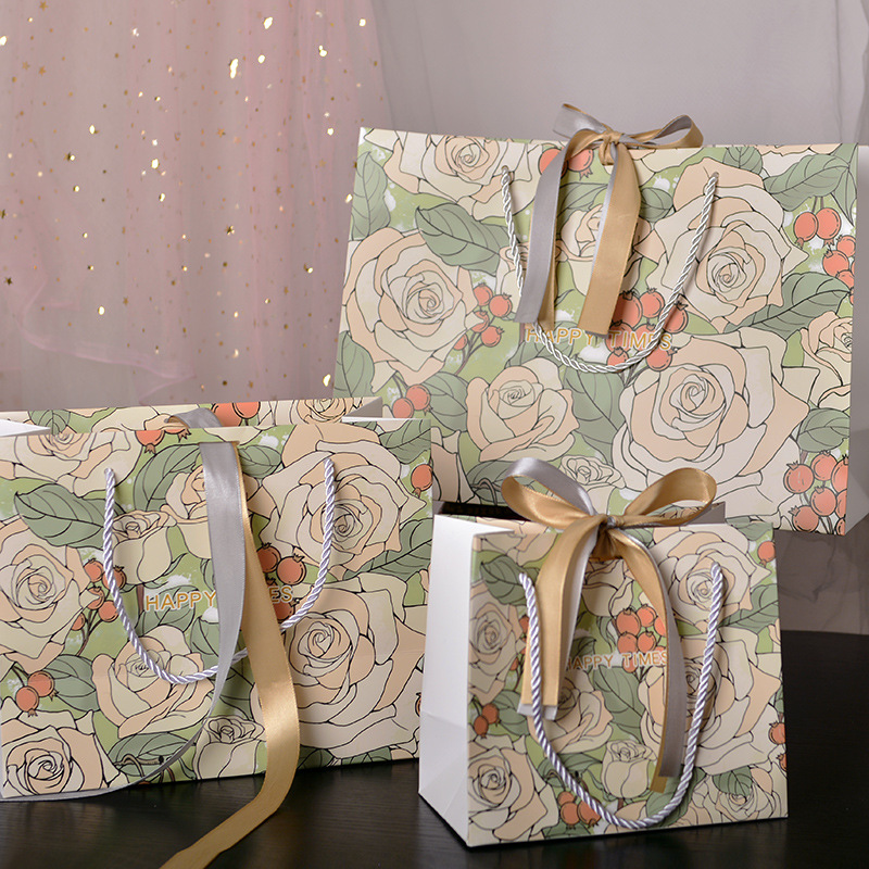 Packaging accessories including tissue paper, ribbons, and gift paper bags