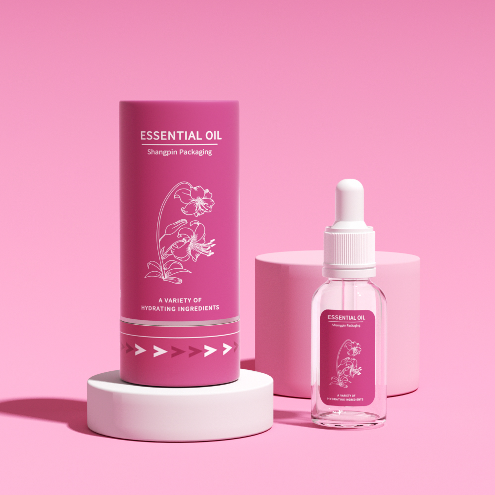 Pink printed carton beside a dropper bottle