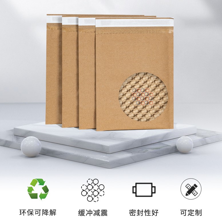 Biodegradable paper bubble mailer with integrated cushioning for plastic-free protection