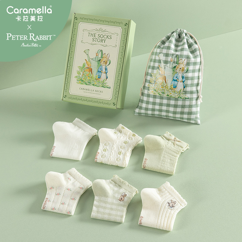 Die-cut handle sock packaging for gift sets