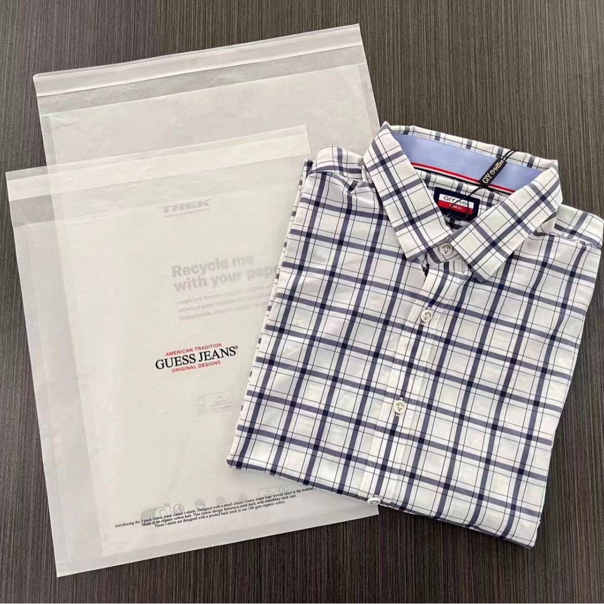 Eco friendly glassine bag Transparent packaging bag with printed design for t-shirts.