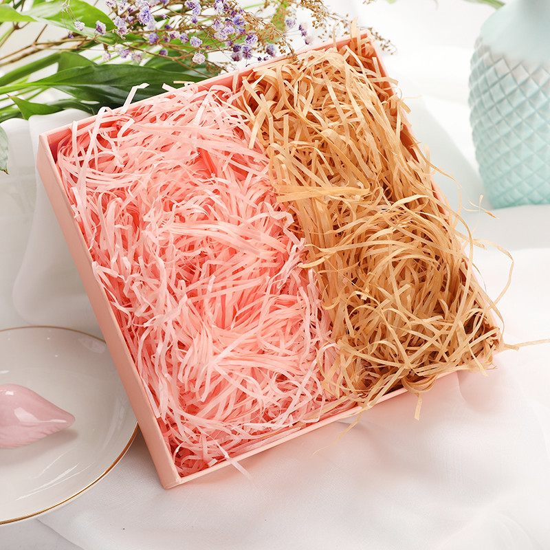 Pink shredded tissue paper for decorative gift wrapping